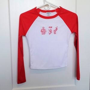 Rue 21 red/white jersey with red oriental graphic sz XS.